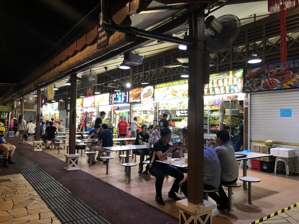 People eating at a Hawker Centre in Singapore