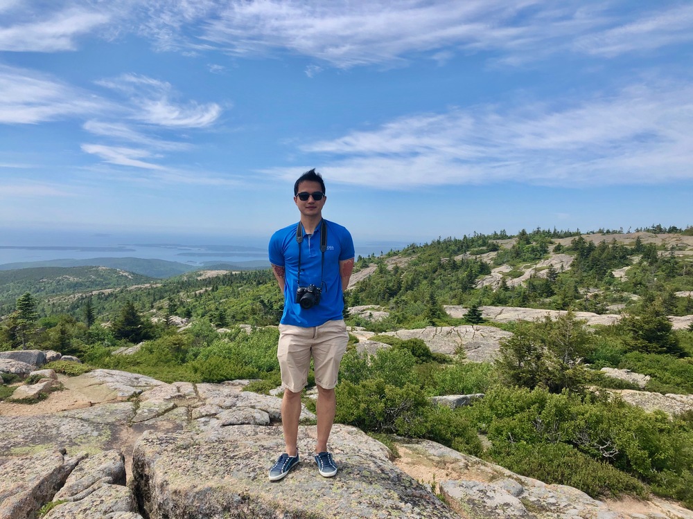 Francis at the peak of the Cadillac mountain