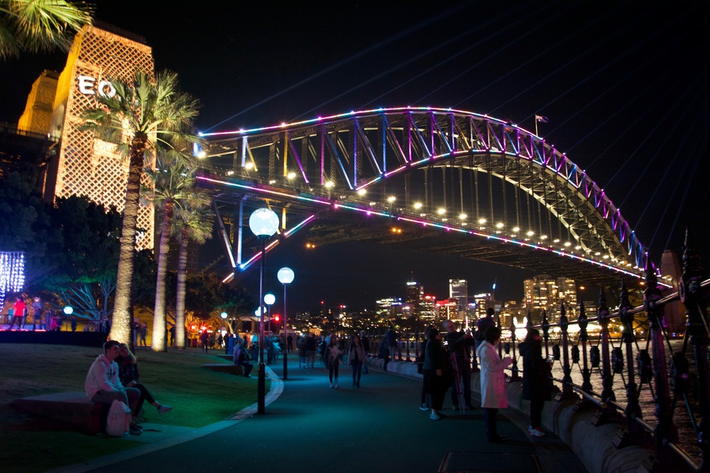 Colourful lights surround the harbour bridge